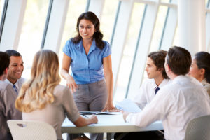Woman leading meeting in office